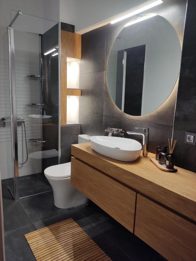 Vrachos Suites Aigio Bagian luar foto